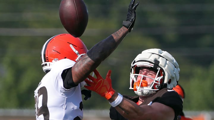 Cleveland Browns cornerback Cameron Mitchell (29) breaks up a pass intended for wide receiver Luke Floriea (37) during NFL training camp at CrossCountry Mortgage Campus, Wednesday, July 30, 2025, in Berea, Ohio.