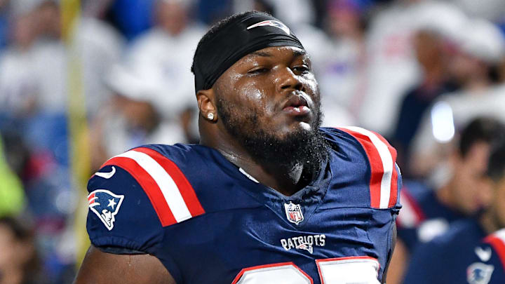 Oct 5, 2025; Orchard Park, New York, USA; New England Patriots defensive end Milton Williams (97) leaves the field after warming up before a game against the Buffalo Bills at Highmark Stadium. Mandatory Credit: Mark Konezny-Imagn Images