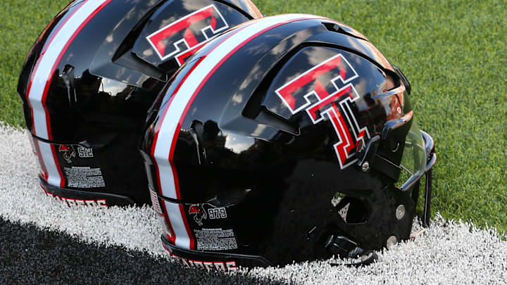 Sep 21, 2024; Lubbock, Texas, USA;  A general view of Texas Tech Red Raiders helmets on the turf before the game between the Arizona State Sun Devils and the Texas Tech Red Raiders at Jones AT&T Stadium and Cody Campbell Field. Mandatory Credit: Michael C. Johnson-Imagn Images