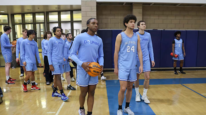 Palisades Charter boys basketball team plays its first game since the Palisades Fire against LACES on Thursday, January 16, 2025.