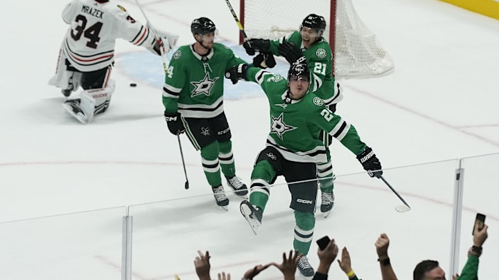 Dec 29, 2023; Dallas, Texas, USA; Dallas Stars center Roope Hintz (24) reacts with defenseman Miro