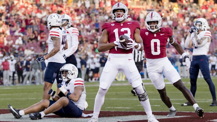 Sep 23, 2023; Stanford, California, USA; Stanford Cardinal wide receiver Elic Ayomanor (13) reacts after scoring a touchdown against the Arizona Wildcats during the third quarter at Stanford Stadium. Mandatory Credit: John Hefti-Imagn Images Sep 23, 2023; Stanford, California, USA; Stanford Cardinal wide receiver Elic Ayomanor (13) reacts after scoring a touchdown against the Arizona Wildcats during the third quarter at Stanford Stadium. Mandatory Credit: John Hefti-Imagn Images