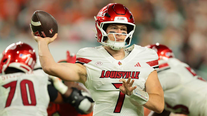 Oct 17, 2025; Miami Gardens, Florida, USA; Louisville Cardinals quarterback Miller Moss (7) throws the football against the Miami Hurricanes during the second quarter at Hard Rock Stadium. Mandatory Credit: Sam Navarro-Imagn Images Oct 17, 2025; Miami Gardens, Florida, USA; Louisville Cardinals quarterback Miller Moss (7) throws the football against the Miami Hurricanes during the second quarter at Hard Rock Stadium. Mandatory Credit: Sam Navarro-Imagn Images