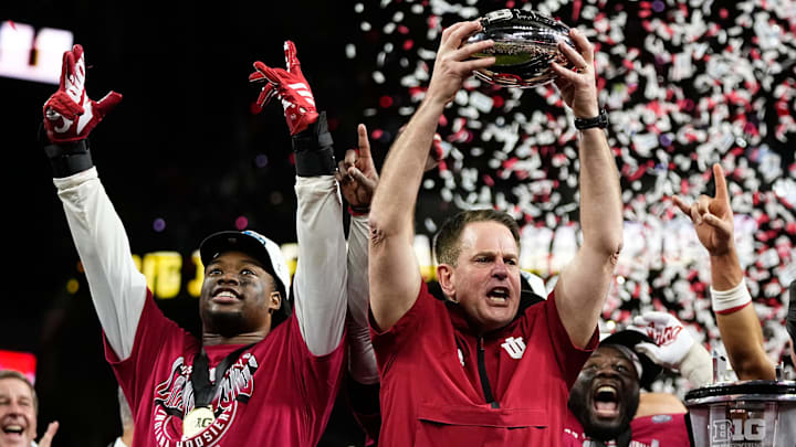 Indiana coach Curt Cignetti hoists the Big Ten Conference championship trophy on Dec. 6, 2025, in Indianapolis. Indiana coach Curt Cignetti hoists the Big Ten Conference championship trophy on Dec. 6, 2025, in Indianapolis.