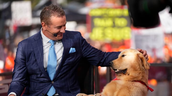 Kirk Herbstreit pets his dog Kirk Herbstreit pets his dog