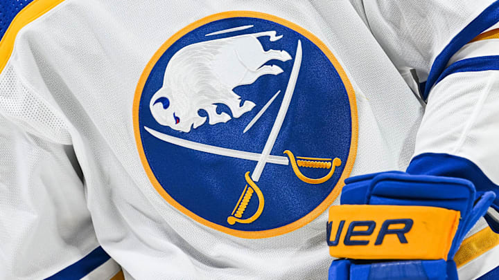 Nov 22, 2022; Montreal, Quebec, CAN; View of a Buffalo Sabres logo on a jersey worn by a member of the team during warm-up before the game against the Montreal Canadiens at Bell Centre. Mandatory Credit: David Kirouac-USA TODAY Sports