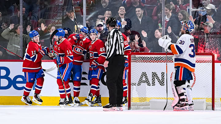 Feb 26, 2026; Montreal, Quebec, CAN; Montreal Canadiens right wing Cole Caufield (13) celebrates his goal against the New York Islanders with teammates during the third period at Bell Centre. Mandatory Credit: David Kirouac-Imagn Images