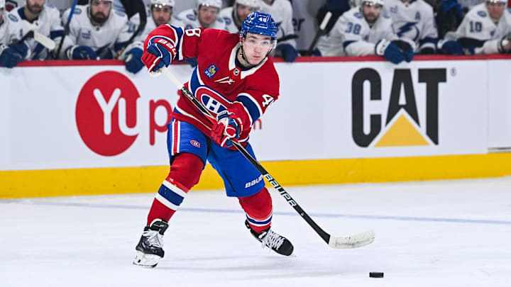 Apr 26, 2026; Montreal, Quebec, CAN; Montreal Canadiens defenseman Lane Hutson (48) passes the puck during the first period in game four of the first round of the 2026 Stanley Cup Playoffs at Bell Centre. Mandatory Credit: David Kirouac-Imagn Images
