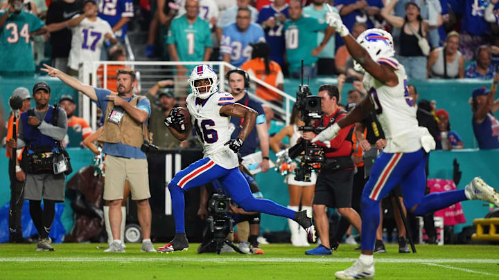 Buffalo Bills cornerback Ja'Marcus Ingram (46) runs the ball for a touchdown after intercepting a pass from Miami Dolphins quarterback Tua Tagovailoa (1, not pictured) during the second half at Hard Rock Stadium.