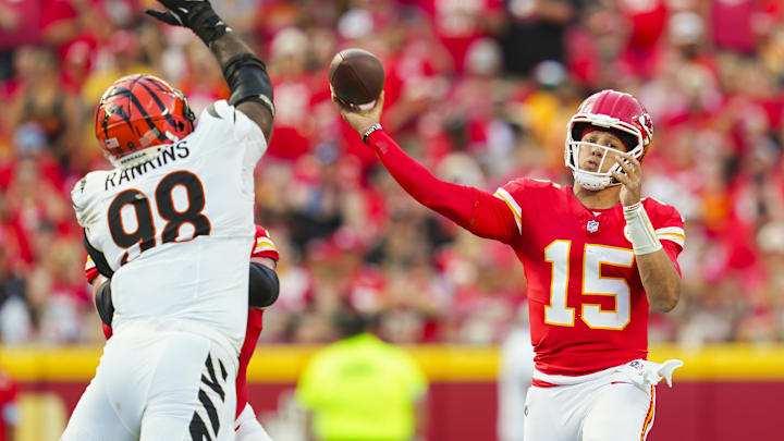 Sep 15, 2024; Kansas City, Missouri, USA; Kansas City Chiefs quarterback Patrick Mahomes (15) throws a pass against Cincinnati Bengals defensive tackle Sheldon Rankins (98) during the first half at GEHA Field at Arrowhead Stadium. Mandatory Credit: Jay Biggerstaff-Imagn Images Sep 15, 2024; Kansas City, Missouri, USA; Kansas City Chiefs quarterback Patrick Mahomes (15) throws a pass against Cincinnati Bengals defensive tackle Sheldon Rankins (98) during the first half at GEHA Field at Arrowhead Stadium. Mandatory Credit: Jay Biggerstaff-Imagn Images