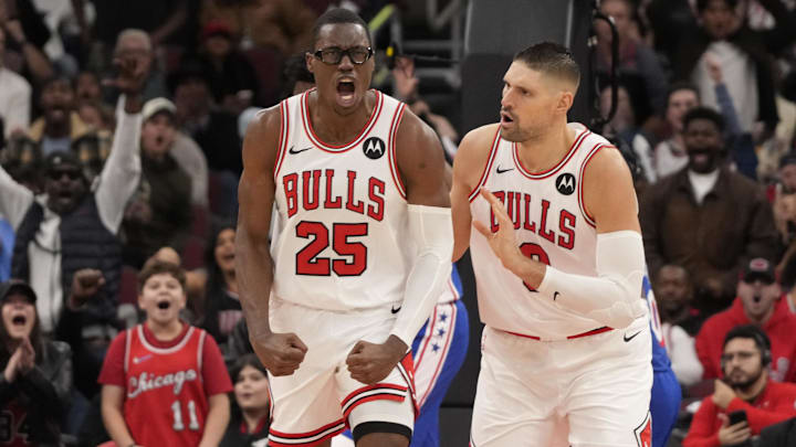 Dec 26, 2025; Chicago, Illinois, USA; Chicago Bulls forward Jalen Smith (25) gestures after dunking the ball against the Philadelphia 76ers as center Nikola Vucevic (9) stands nearby during the second half at United Center. Mandatory Credit: David Banks-Imagn Images
