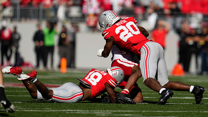 Ohio State Buckeyes linebacker Arvell Reese (20) hits Nebraska Cornhuskers wide receiver Jahmal Banks (4) during the second half of the NCAA football game at Ohio Stadium in Columbus on Saturday, Oct. 26, 2024. Reese was called for targeting on the play. Ohio State won 21-17. Ohio State Buckeyes linebacker Arvell Reese (20) hits Nebraska Cornhuskers wide receiver Jahmal Banks (4) during the second half of the NCAA football game at Ohio Stadium in Columbus on Saturday, Oct. 26, 2024. Reese was called for targeting on the play. Ohio State won 21-17.
