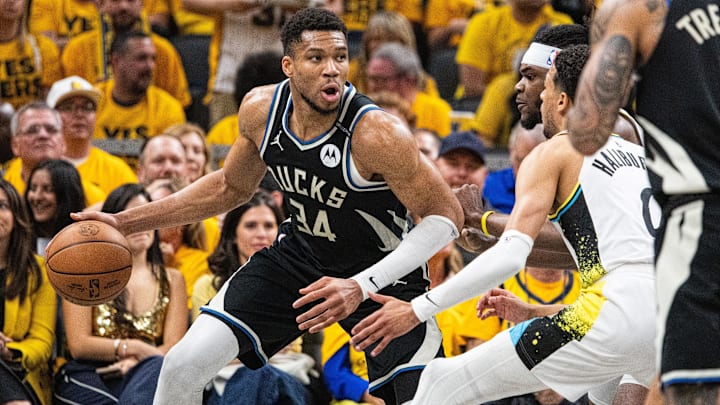 Apr 29, 2025; Indianapolis, Indiana, USA; Milwaukee Bucks forward Giannis Antetokounmpo (34) dribbles the ball while Indiana Pacers forward Jarace Walker (5) defends during game five of the first round for the 2024 NBA Playoffs at Gainbridge Fieldhouse. Mandatory Credit: Trevor Ruszkowski-Imagn Images Apr 29, 2025; Indianapolis, Indiana, USA; Milwaukee Bucks forward Giannis Antetokounmpo (34) dribbles the ball while Indiana Pacers forward Jarace Walker (5) defends during game five of the first round for the 2024 NBA Playoffs at Gainbridge Fieldhouse. Mandatory Credit: Trevor Ruszkowski-Imagn Images