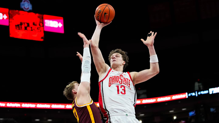 Ohio State Buckeyes center Christoph Tilly (13) shoots the ball against Minnesota Golden Gophers forward Cade Tyson (10) in the first half of the NCAA basketball game at Value City Arena on Tuesday, Jan. 20, 2026 in Columbus, Ohio.