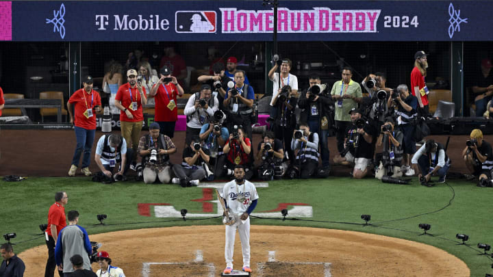 Jul 15, 2024; Arlington, TX, USA; National League outfielder Teoscar Hernandez of the Los Angeles Dodgers (37) poses with the trophy after he wins the 2024 All Star Game Home Run Derby at Globe Life Field. Mandatory Credit: Jerome Miron-USA TODAY Sports Jul 15, 2024; Arlington, TX, USA; National League outfielder Teoscar Hernandez of the Los Angeles Dodgers (37) poses with the trophy after he wins the 2024 All Star Game Home Run Derby at Globe Life Field. Mandatory Credit: Jerome Miron-USA TODAY Sports