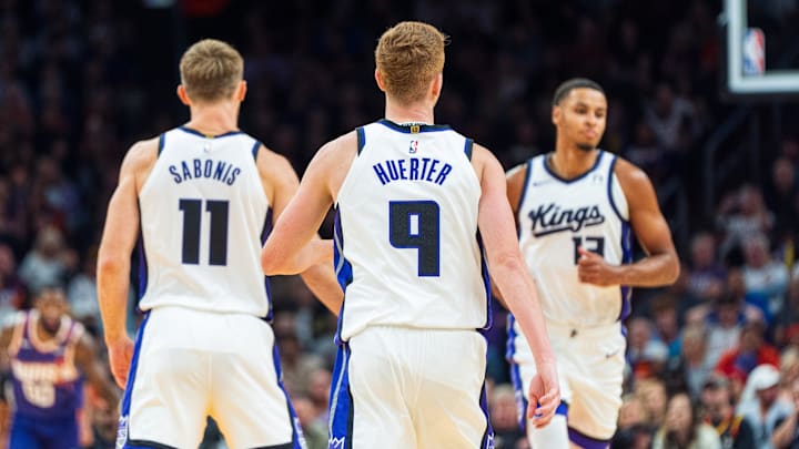 Nov 10, 2024; Phoenix, Arizona, USA; A general view of Sacramento Kings players forward-center Domantas Sabonis (11), guard-forward Kevin Huerter (9) and forward Keegan Murray (13) during the first half of a game against the Phoenix Suns at Footprint Center. 