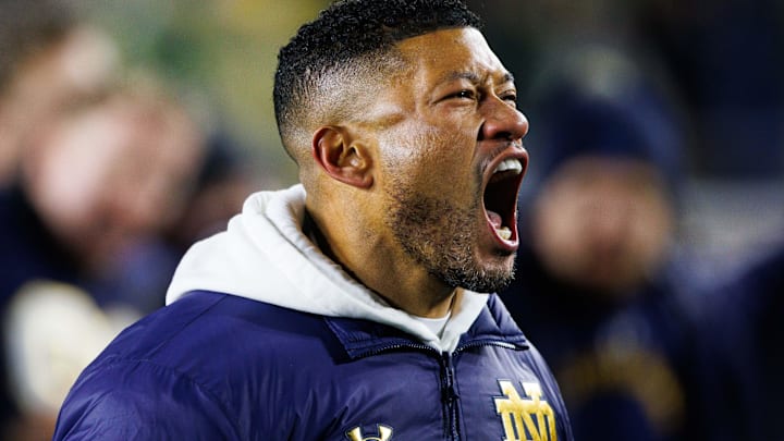 Notre Dame head coach Marcus Freeman celebrates after winning the first round of the College Football Playoff 27-17 against Indiana at Notre Dame Stadium on Friday, Dec. 20, 2024, in South Bend.