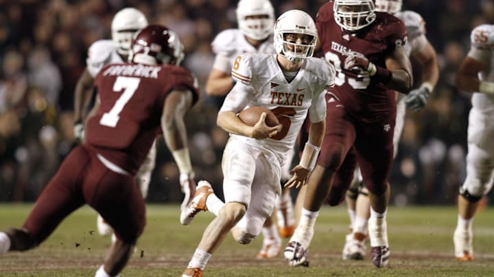 Nov 24, 2011; College Station, TX, USA; Texas Longhorns quarterback Case McCoy (6) runs the ball against the Texas A&M Aggies in the fourth quarter at Kyle Field. Texas defeated Texas A&M 27-25.  Mandatory Credit: Brett Davis-Imagn Images