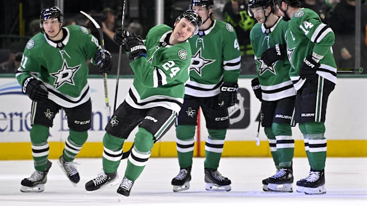 Jan 2, 2025; Dallas, Texas, USA; Dallas Stars center Roope Hintz (24) and left wing Jason Robertson (21) and defenseman Miro Heiskanen (4) and center Wyatt Johnston (53) and left wing Jamie Benn (14) celebrates after Hintz scores a power play goal against the Ottawa Senators during the first period at the American Airlines Center. Mandatory Credit: Jerome Miron-Imagn Images
