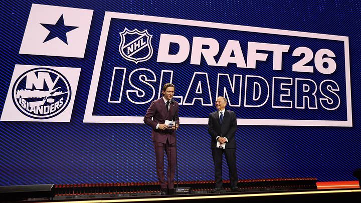Jun 26, 2026; Buffalo, New York, USA; New York Islanders player Matthew Schaefer announces the thirteenth pick in the first round of the 2026 NHL Draft in front of NHL commissioner Gary Bettman at KeyBank Center. Mandatory Credit: Timothy T. Ludwig-Imagn Images