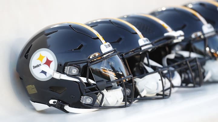 Oct 6, 2024; Pittsburgh, Pennsylvania, USA; Pittsburgh Steelers helmets on the bench before a game against the Dallas Cowboys at Acrisure Stadium. Mandatory Credit: Charles LeClaire-Imagn Images