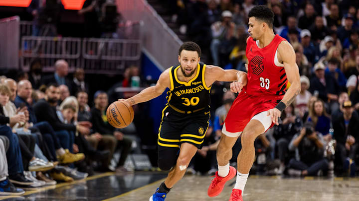 Golden State Warriors guard Stephen Curry (30) drives.