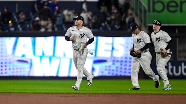 Sep 29, 2024; Bronx, New York, USA; New York Yankees outfielder Jasson Domínguez (89), New York Yankees outfielder Trent Grisham (12) and New York Yankees outfielder Alex Verdugo (24) react after winning against the Pittsburgh Pirates at Yankee Stadium. Mandatory Credit: John Jones-Imagn Images