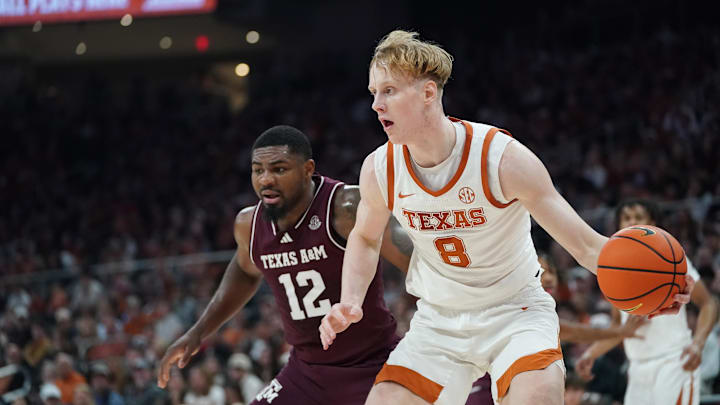 Jan 17, 2026; Austin, Texas, USA; Texas Longhorns center Matas Vokietaitis (8) moves against Texas A&M Aggies forward Rashaun Agee (12) during the first half at Moody Center. Mandatory Credit: Dustin Safranek-Imagn Images