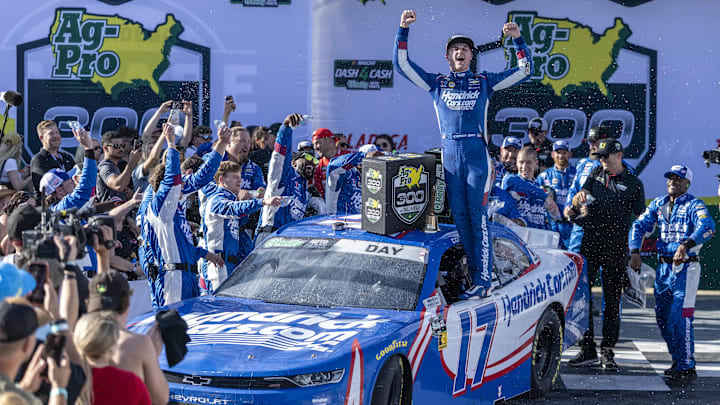 Apr 25, 2026; Talladega, Alabama, USA; O'Reilly Auto Parts Series driver Corey Day (17) celebrates winning the race with his crew after the AG-Pro 300 NASCAR O’Reilly Auto Parts Series race at Talladega Superspeedway.
