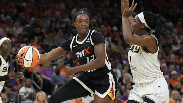 May 21, 2023; Phoenix, Arizona, USA; Phoenix Mercury forward Michaela Onyenwere (12) drives around Chicago Sky center Elizabeth Williams (1) in the first half at Footprint Center. Mandatory Credit: Rick Scuteri-Imagn Images May 21, 2023; Phoenix, Arizona, USA; Phoenix Mercury forward Michaela Onyenwere (12) drives around Chicago Sky center Elizabeth Williams (1) in the first half at Footprint Center. Mandatory Credit: Rick Scuteri-Imagn Images