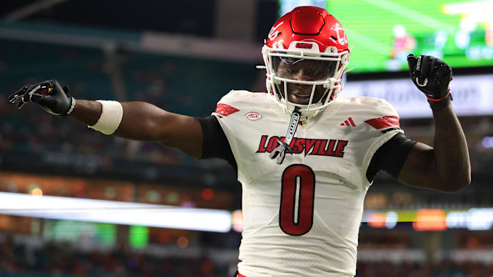 Oct 17, 2025; Miami Gardens, Florida, USA; Louisville Cardinals wide receiver Chris Bell (0) celebrates after scoring a touchdown against the Miami Hurricanes during the first quarter at Hard Rock Stadium. Mandatory Credit: Sam Navarro-Imagn Images Oct 17, 2025; Miami Gardens, Florida, USA; Louisville Cardinals wide receiver Chris Bell (0) celebrates after scoring a touchdown against the Miami Hurricanes during the first quarter at Hard Rock Stadium. Mandatory Credit: Sam Navarro-Imagn Images