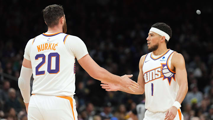 Apr 5, 2024; Phoenix, Arizona, USA; Phoenix Suns center Jusuf Nurkic (20) and Phoenix Suns guard