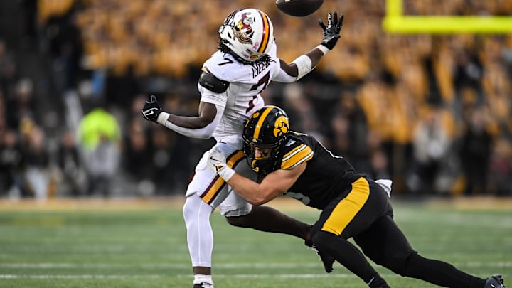 Oct 25, 2025; Iowa City, Iowa, USA; Iowa Hawkeyes defensive back Zach Lutmer (6) breaks up the pass for Minnesota Golden Gophers running back Fame Ijeboi (7) during the fourth quarter at Kinnick Stadium. Mandatory Credit: Jeffrey Becker-Imagn Images Oct 25, 2025; Iowa City, Iowa, USA; Iowa Hawkeyes defensive back Zach Lutmer (6) breaks up the pass for Minnesota Golden Gophers running back Fame Ijeboi (7) during the fourth quarter at Kinnick Stadium. Mandatory Credit: Jeffrey Becker-Imagn Images