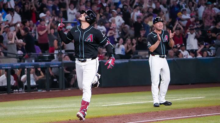Sep 20, 2026; Phoenix, Arizona, USA; Arizona Diamondbacks third baseman Nolan Arenado (28) celebrates a grand slam during the fifth inning at Chase Field during the game between Arizona Diamondbacks and the New York Yankees. Mandatory Credit: Arianna Grainey-Imagn Images Sep 20, 2026; Phoenix, Arizona, USA; Arizona Diamondbacks third baseman Nolan Arenado (28) celebrates a grand slam during the fifth inning at Chase Field during the game between Arizona Diamondbacks and the New York Yankees. Mandatory Credit: Arianna Grainey-Imagn Images