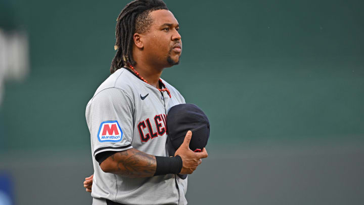 Jun 28, 2024; Kansas City, Missouri, USA;  Cleveland Guardians third baseman Jose Ramirez (11) during the national anthem before a game against the Kansas City Royals at Kauffman Stadium. Mandatory Credit: Peter Aiken-USA TODAY Sports