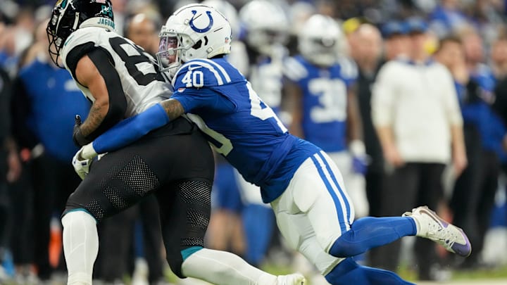 Indianapolis Colts cornerback Jaylon Jones (40) works to bring down Jacksonville Jaguars tight end Brenton Strange (85) on Sunday, Jan. 5, 2025, during a game against the Jacksonville Jaguars at Lucas Oil Stadium in Indianapolis. Indianapolis Colts cornerback Jaylon Jones (40) works to bring down Jacksonville Jaguars tight end Brenton Strange (85) on Sunday, Jan. 5, 2025, during a game against the Jacksonville Jaguars at Lucas Oil Stadium in Indianapolis.