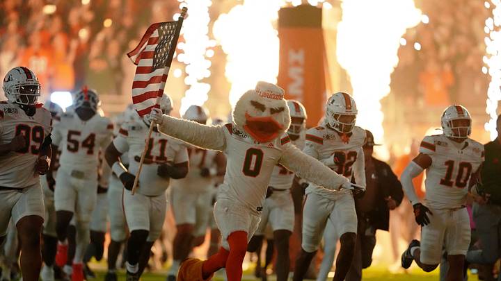 Jan 19, 2026; Miami Gardens, FL, USA; Miami Hurricanes mascot Sebastian the Ibis leads the team onto the field before the CFP National Championship college football game between the Indiana Hoosiers and the Miami Hurricanes at Hard Rock Stadium. Mandatory Credit: Kirby Lee-Imagn Images