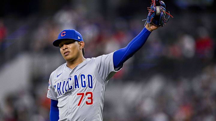 Mar 31, 2024; Arlington, Texas, USA; Chicago Cubs relief pitcher Adbert Alzolay (73) pitches during the game between the Texas Rangers and the Chicago Cubs at Globe Life Field. Mandatory Credit: Jerome Miron-Imagn Images