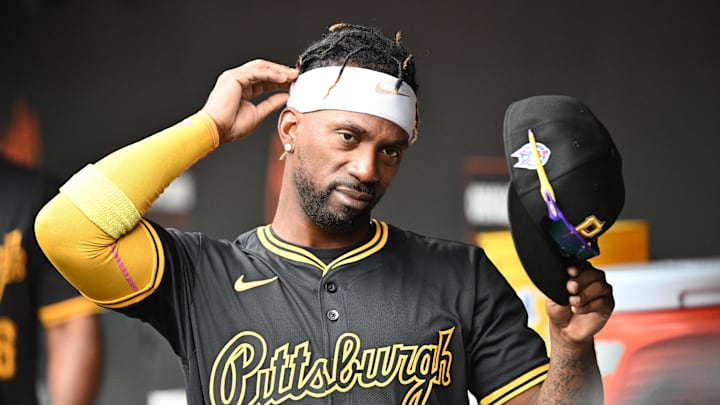 Sep 11, 2025; Baltimore, Maryland, USA;  Pittsburgh Pirates designated hitter Andrew McCutchen (22) stands in the dugout before the game between the Baltimore Orioles and the Pittsburgh Pirates at Oriole Park at Camden Yards. Mandatory Credit: James A. Pittman-Imagn Images