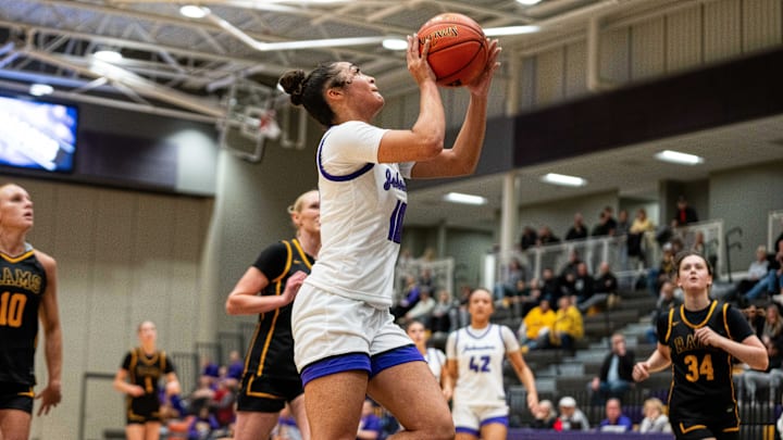 Jenica Lewis and the Johnston girls topped West Des Moines Dowling Tuesday night.