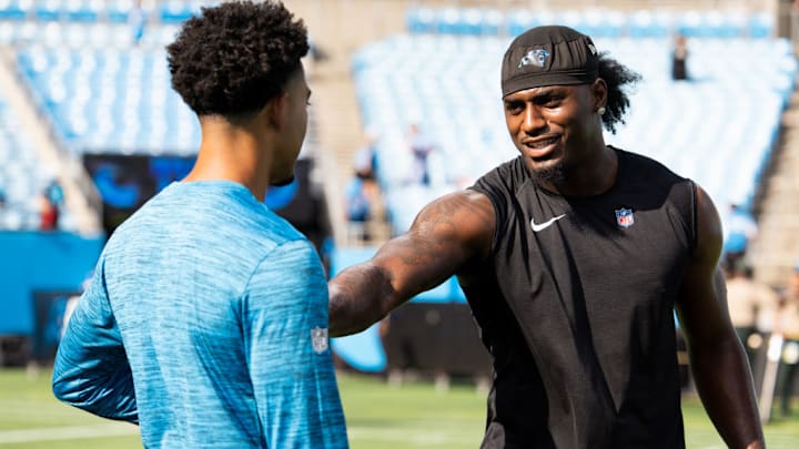 CHARLOTTE, NORTH CAROLINA - AUGUST 17: Xavier Legette #17 of the Carolina Panthers warms up with Bryce Young #9 of the Carolina Panthers before a preseason game against the New York Jets at Bank of America Stadium on August 17, 2024 in Charlotte, North Carolina. CHARLOTTE, NORTH CAROLINA - AUGUST 17: Xavier Legette #17 of the Carolina Panthers warms up with Bryce Young #9 of the Carolina Panthers before a preseason game against the New York Jets at Bank of America Stadium on August 17, 2024 in Charlotte, North Carolina.