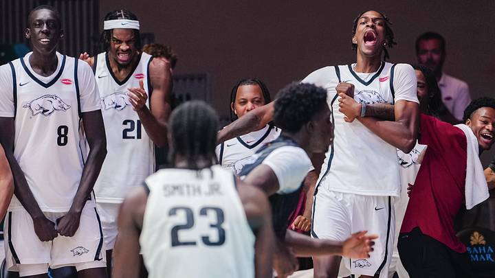 The Razorback bench celebrates during Arkansas' 91-49 win over Toros Del Valle in Nassau, Bahamas, on Monday, Aug. 3, 2026. The Razorback bench celebrates during Arkansas' 91-49 win over Toros Del Valle in Nassau, Bahamas, on Monday, Aug. 3, 2026.