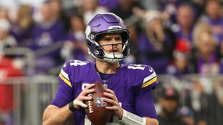 Dec 8, 2024; Minneapolis, Minnesota, USA; Minnesota Vikings quarterback Sam Darnold (14) looks to throw against the Atlanta Falcons during the second quarter at U.S. Bank Stadium. Mandatory Credit: Matt Krohn-Imagn Images