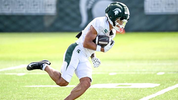 Michigan State receiver Samson Gash runs after a catch during football practice on Monday, Aug. 17, 2026, in East Lansing. Michigan State receiver Samson Gash runs after a catch during football practice on Monday, Aug. 17, 2026, in East Lansing.