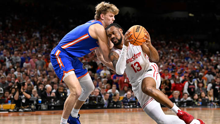 Roberts drives with the basketball during the national championship game Monday in San Antonio. 