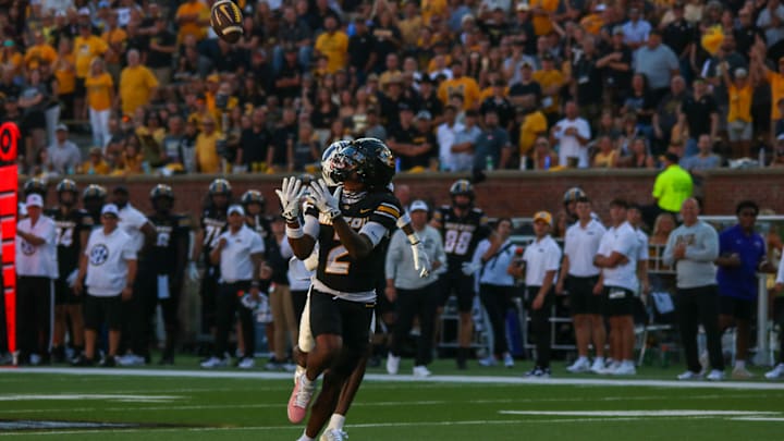 Aug 28, 2025; Columbia, MO, USA; Mizzou wide receiver Marquis (2) Johnson catches a 49 yard pass from quarterback Beau Pribula to score the first touchdown of the game.