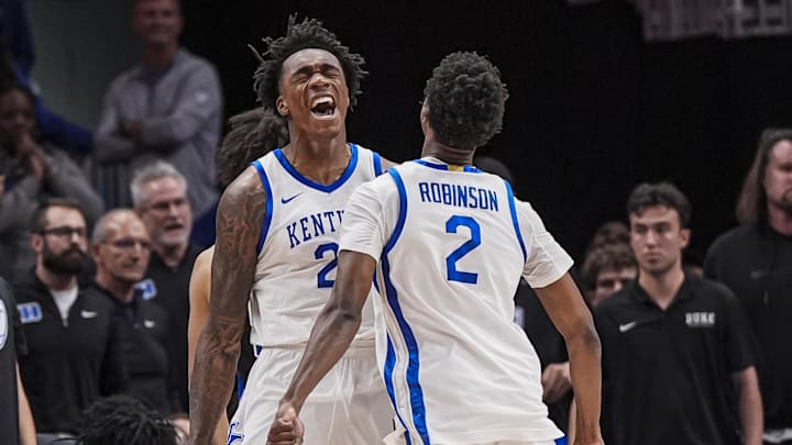 Nov 12, 2024; Atlanta, Georgia, USA; Kentucky Wildcats center Amari Williams (22) reacts with guard Jaxson Robinson (2) against the Duke Blue Devils during the second half at State Farm Arena. Mandatory Credit: Dale Zanine-Imagn Images Nov 12, 2024; Atlanta, Georgia, USA; Kentucky Wildcats center Amari Williams (22) reacts with guard Jaxson Robinson (2) against the Duke Blue Devils during the second half at State Farm Arena. Mandatory Credit: Dale Zanine-Imagn Images