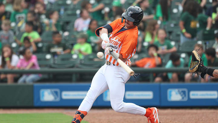 Hooks batter Jacob Melton fouls off a ball during Education Day at Whataburger Field, Wednesday, May 8, 2024, in Corpus Christi, Texas.