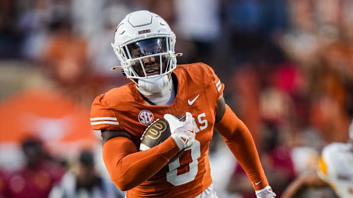 Texas Longhorns linebacker Anthony Hill Jr. (0) runs the ball for a touchdown off an interception, which was disallowed due to an illegal block in the first half of the Texas Longhorns' game against the ULM Warhawks at Darrell K Royal Texas Memorial Stadium in Austin, Sept. 21, 2024.