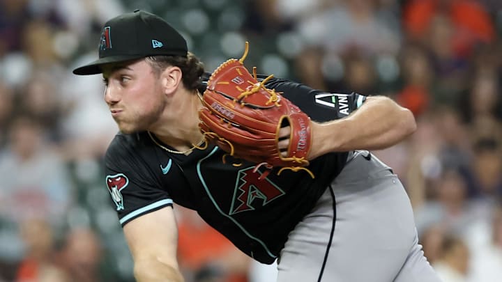 Sep 6, 2024; Houston, Texas, USA; Arizona Diamondbacks starting pitcher Brandon Pfaadt (32) pitches against the Houston Astros in the first inning at Minute Maid Park. Mandatory Credit: Thomas Shea-Imagn Images